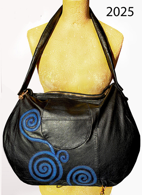 Velika usnjena torba, ki se nosi na obe strani