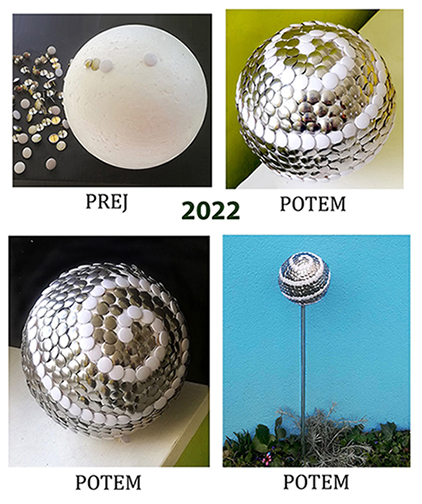 Okrasna krogla iz stiropora, 'oblečena' v bele in srebrne risalne žebljičke